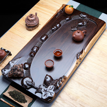 Log whole ebony tea tray Solid wood Kung Fu tea set Household tea table Simple tea sea large carved fish water stream