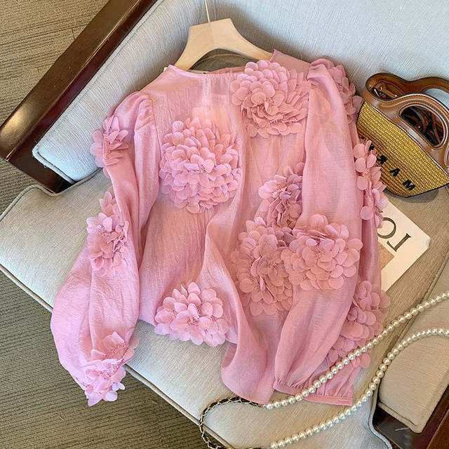 Design sense French temperament gentle wind pink flower long-sleeved shirt women's autumn loose all-match chic top trend