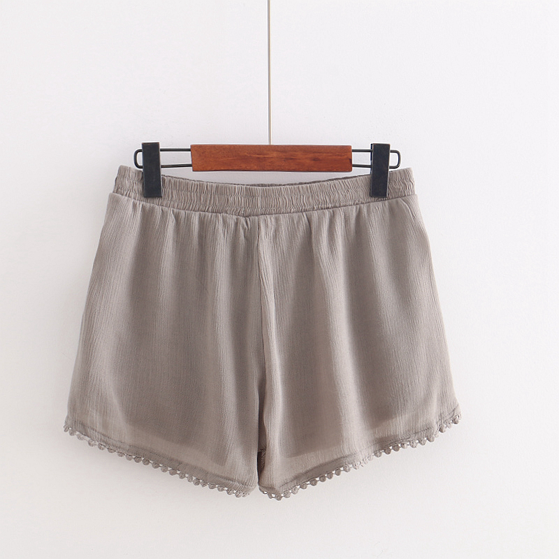I8D hè phong cách mới 2018 quần short nữ thời trang thêu eo thun ren hoang dã rộng chân bãi biển quần nóng quần đùi bò