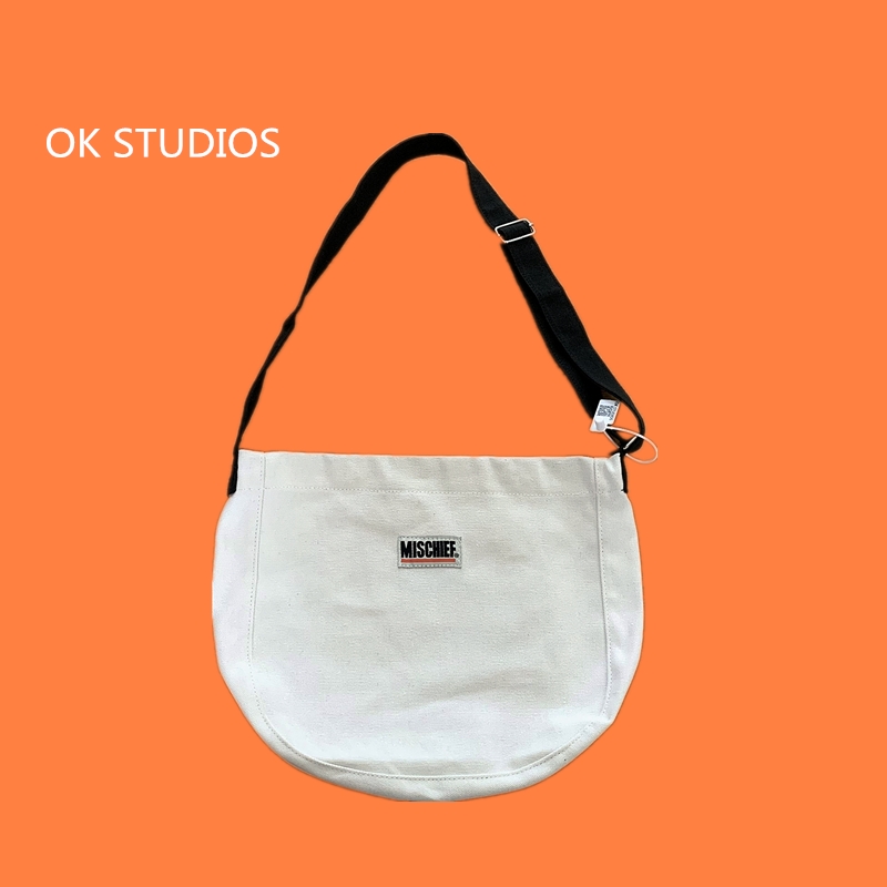 OK limited homemade Korean literature and art simple messenger canvas bag men and women Japanese Hong Kong fashion brand student school bag ins