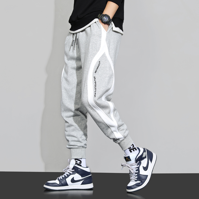 Hong Kong tide brand elastic waist sports pants men's Korean version of the drawstring loose all-match casual pants harem stitching pants