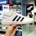 Giày nam Adidas 2019 xuân mới cao giúp giày nhỏ màu trắng da thoáng khí thể thao thông thường giày thể thao nữ 2021 Dép / giày thường