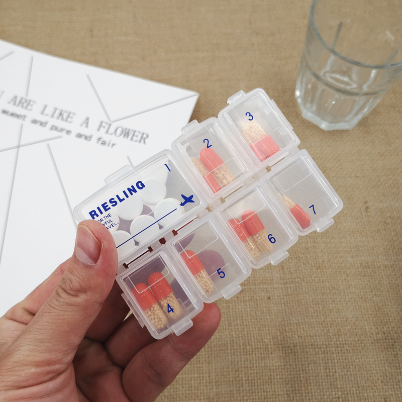 Japan KM portable one week drug box week seven small medicine box containing box mini-fragmentable pack