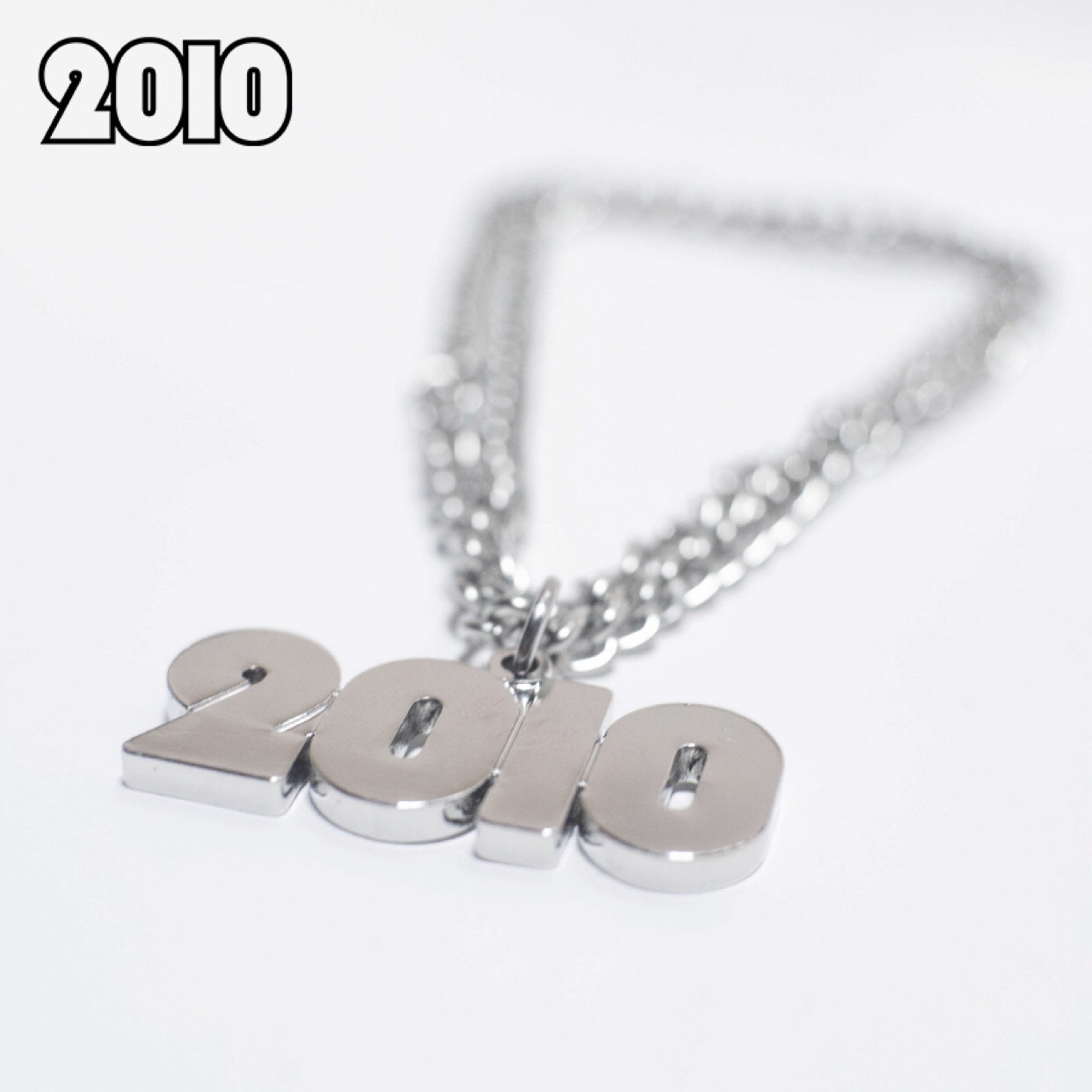skate necklace new cross triangle goat head bracket titanium steel material 2010 skateboard street brand trend 