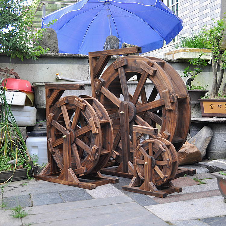 Fengshui wheel waterfish pipeline pool fake mountain wagon large and medium sized water truck wooden fake mountain fountain