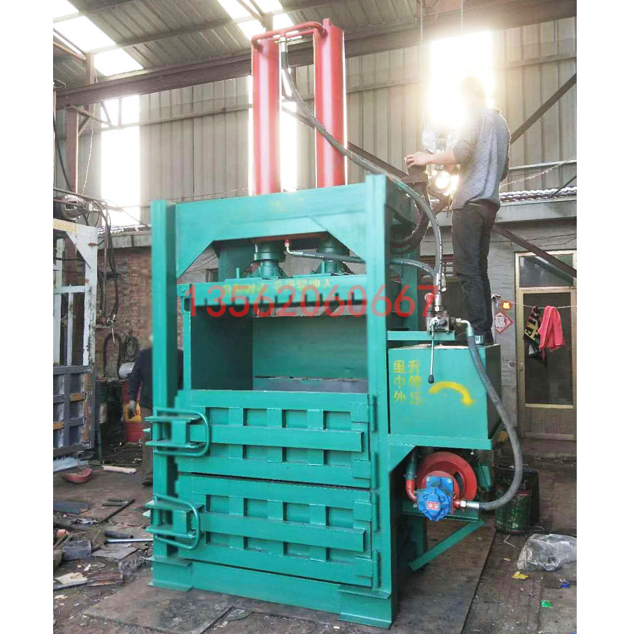 100 tons vertical waste paper shell hydraulic baler briquetting machine Waste paper box plastic bottle cans waste briquetting machine