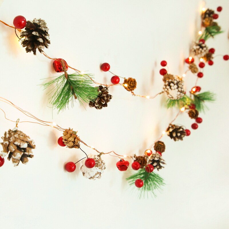 Christmas decorations arranged lanterns pine cones decorative lights string Mori led pine needles bells holiday handmade creation