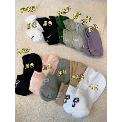 Five pairs of TNA multi-color boat socks for women with free shipping