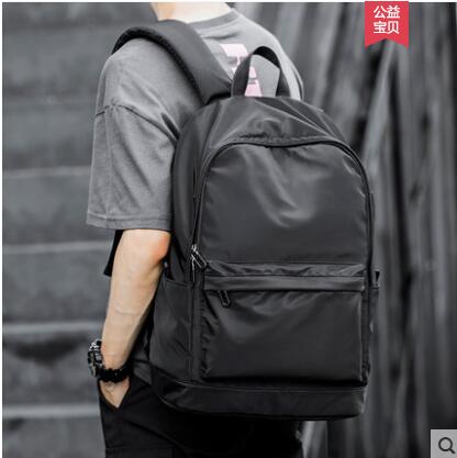 Hong Kong large capacity tide brand simple backpack men's travel computer backpack leisure junior high school school students school bag men's bag