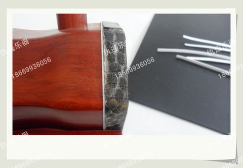 [Phụ kiện một nhân dân tệ] Chỉ nha khoa Erhu Sản xuất nhạc cụ Phụ kiện da Dây đeo da giả Đường viền trắng Capo guitar giá