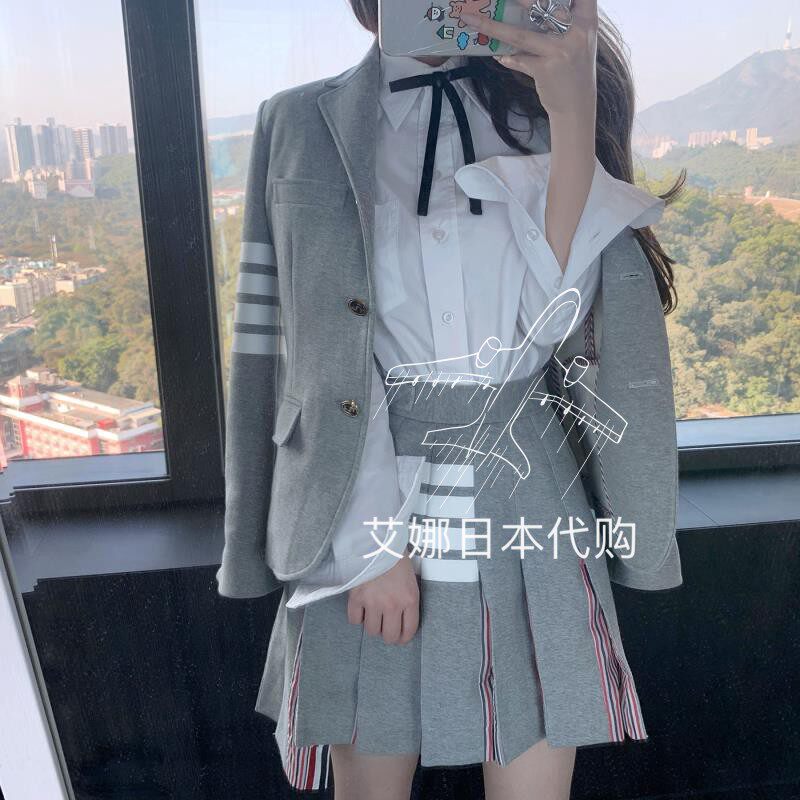 Aina Day Thom browne 20 knitted jacket single row of four bars male and female suits casual