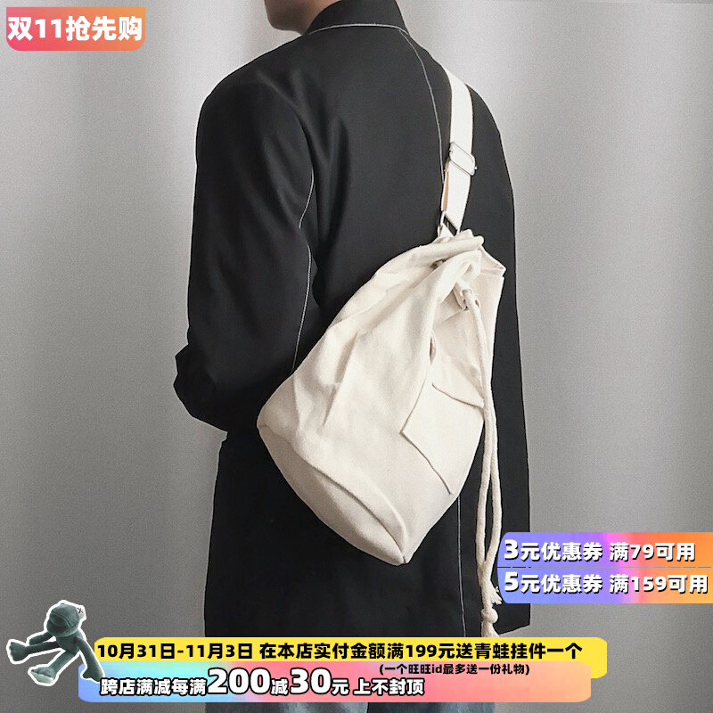 KAFKAsSHOP bucket drawstring messenger canvas bag simple street beat hand-held black and white one-shoulder student chest bag tide