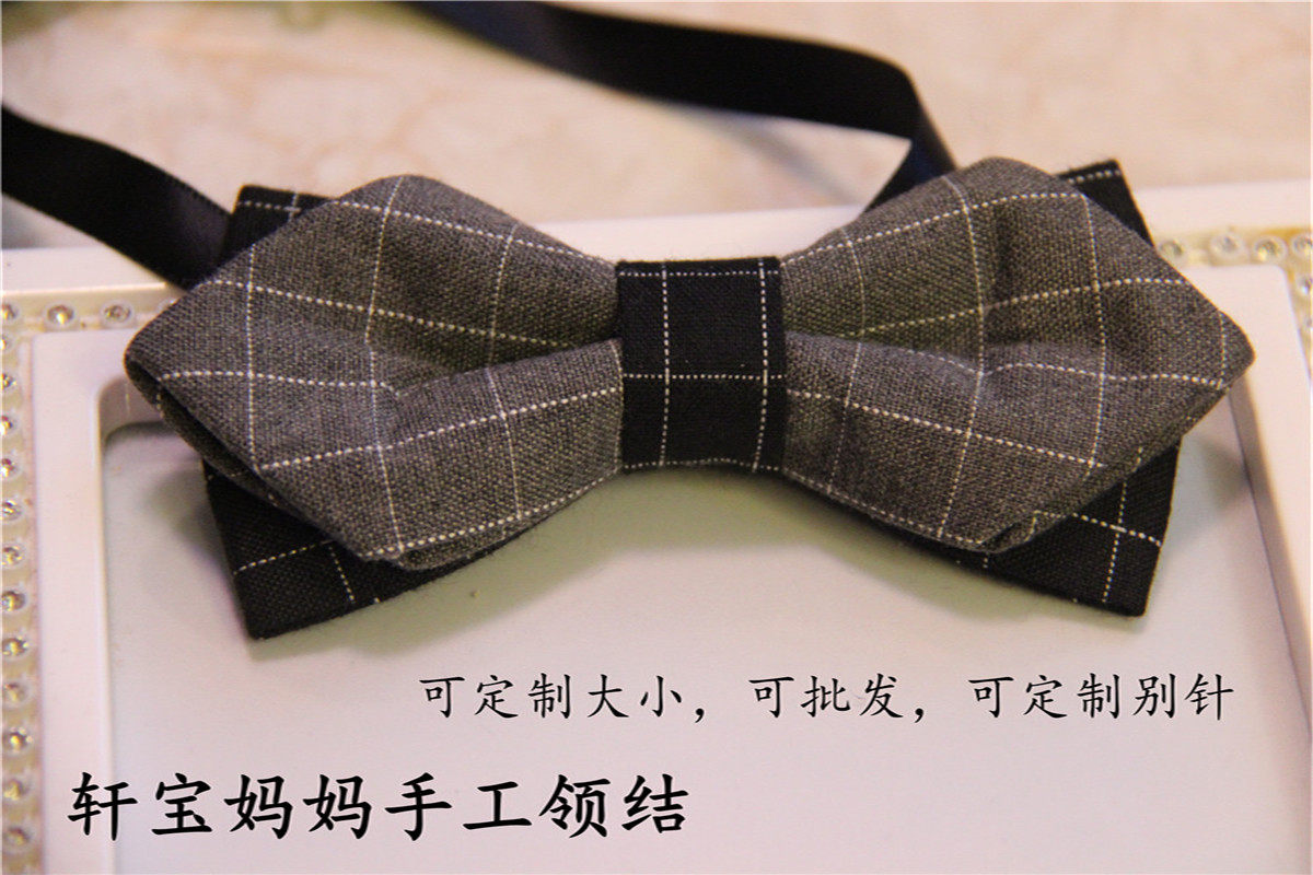 Female boy's Korean version of the complex Guinglen grid baby led with bow tie performance to host children's new tie