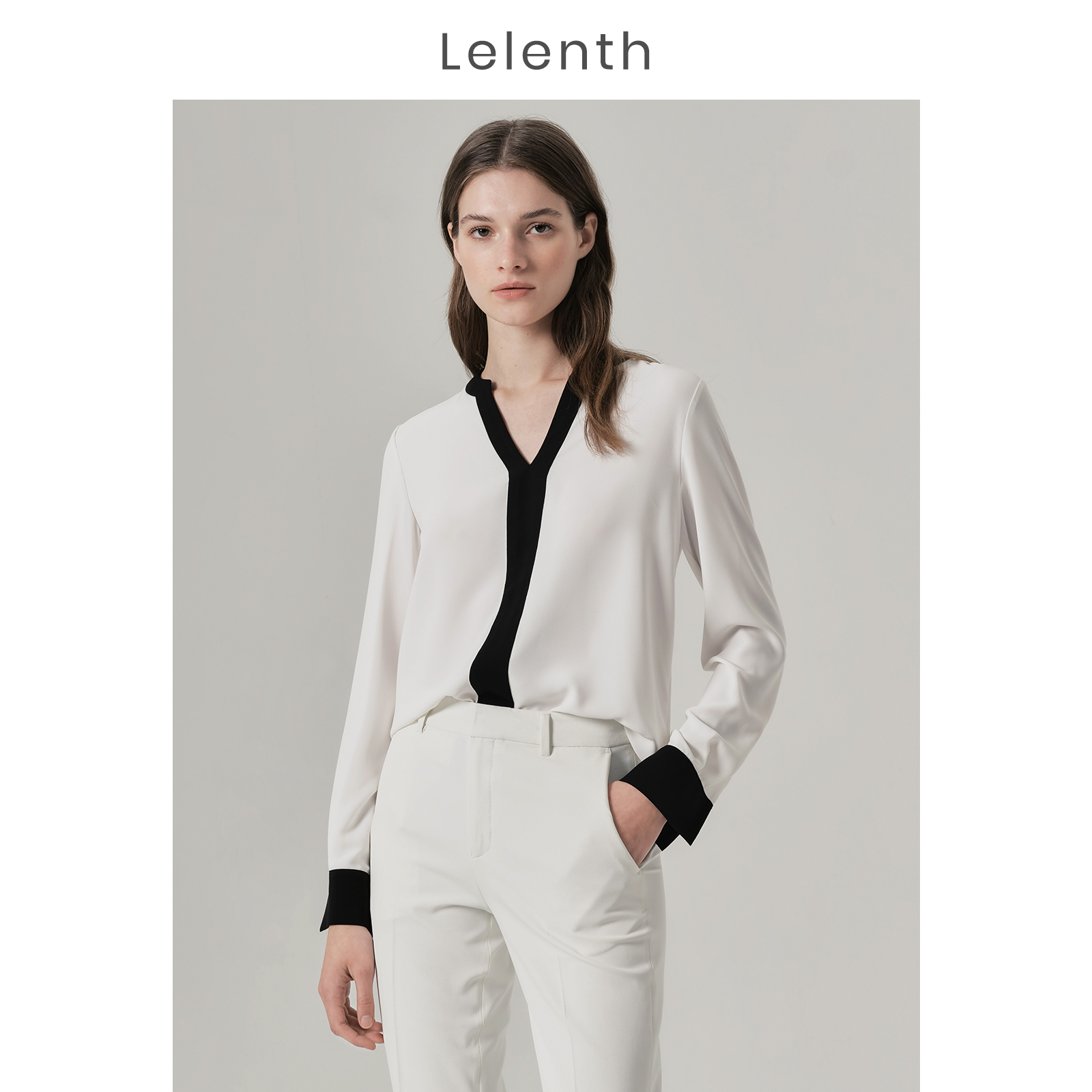 2021 Fall new white Cognitive Minimalist Temperament Snowspun Shirt Woman V Collar Commuter OL Loose Conspicuous Blouse