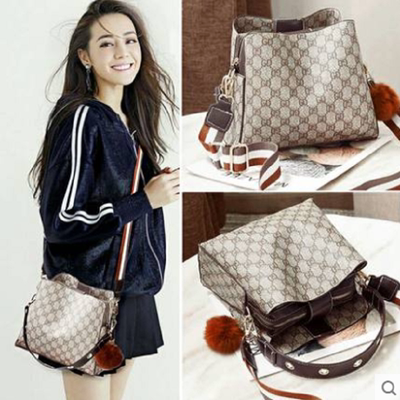 女士单肩包法国小众洋气斜挎包水桶包女包