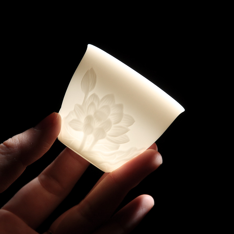 High tea FengTang dehua white porcelain undressed ore kaolin to suggest cups embossed lotus sample tea cup move masters cup
