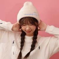 Югуи собака белая