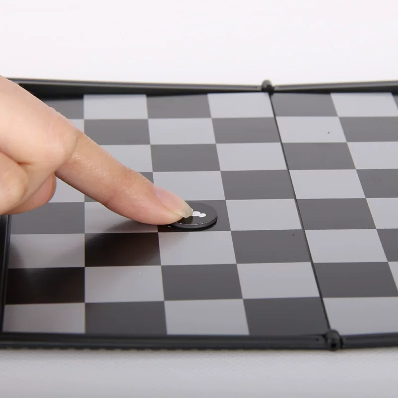 Magnetic foldable small handheld chess from soft rubber