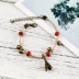 Qingge Handmade Handmade Phong cách dân tộc Vòng tay gốm Hợp kim Tháp sắt Chuông Phụ kiện tay Handmade vòng tay Vòng đeo tay Clasp