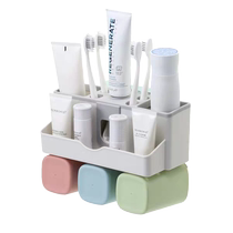 HOUYA punch-free toothbrush holder suction wall-mounted mouthwash set holder bathroom wall-mounted toothbrushing cup holder