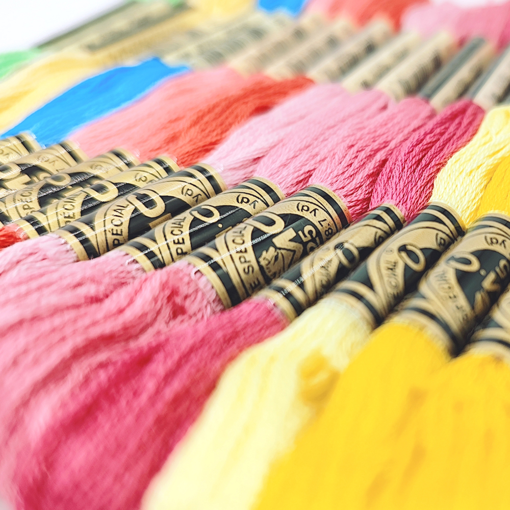 DMC十字绣材料：鲜花小屋印花的独特魅力