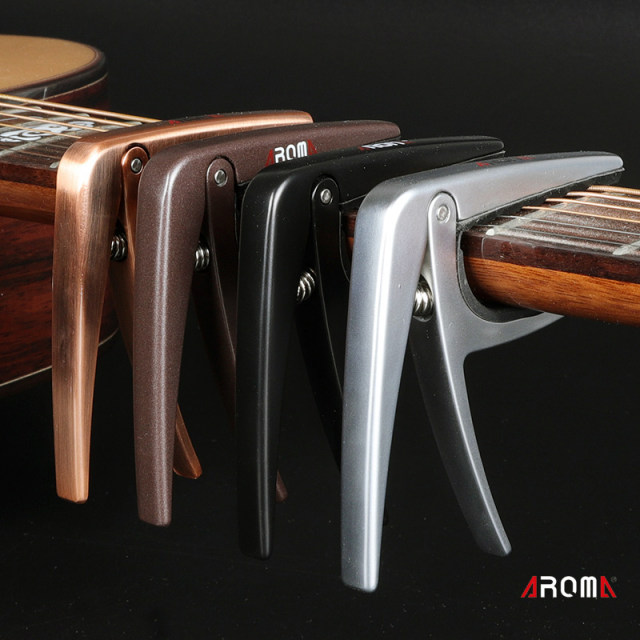 Anoma Guitar Capo AC01AC21 ໂລຫະ Bakelite ຄລາສສິກ Transposition Folk Capo