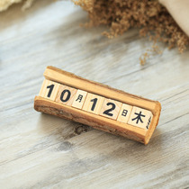 Natural wooden desk calendar calendar perpetual calendar photo props pendulum shooting shadow background retro ornaments shooting props
