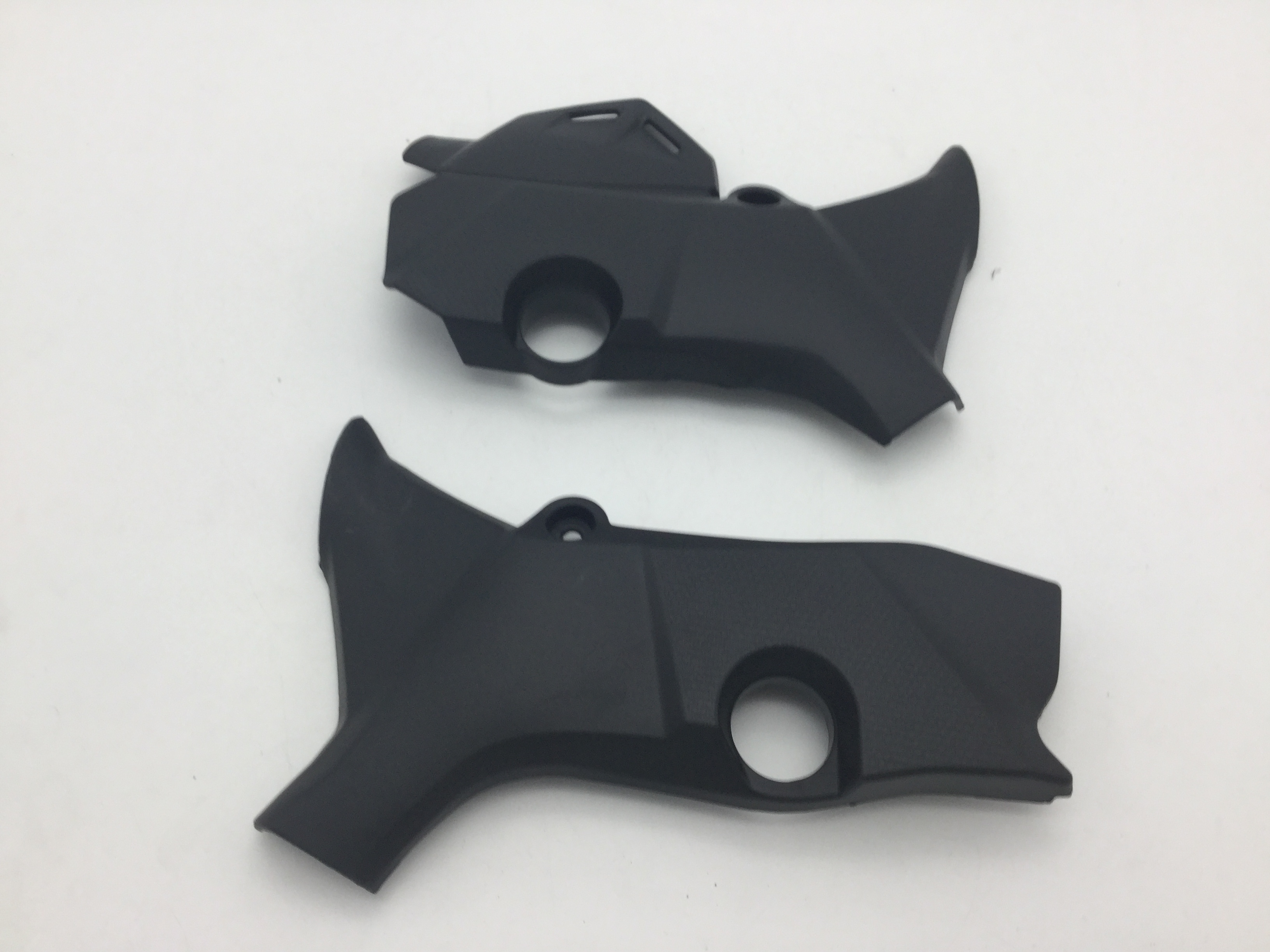 Accessories apply Qianjiang Hongbao Dragon BJ150-29B left and right foot pedal decorative plate TNT150 front pedalling protection plate