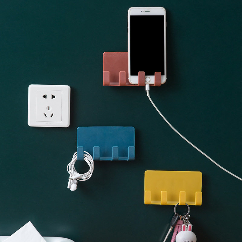 Paste vertical paper towel clip mobile phone holder mobile phone holder on the wall mobile phone holder mobile phone charging wall hanging free punch