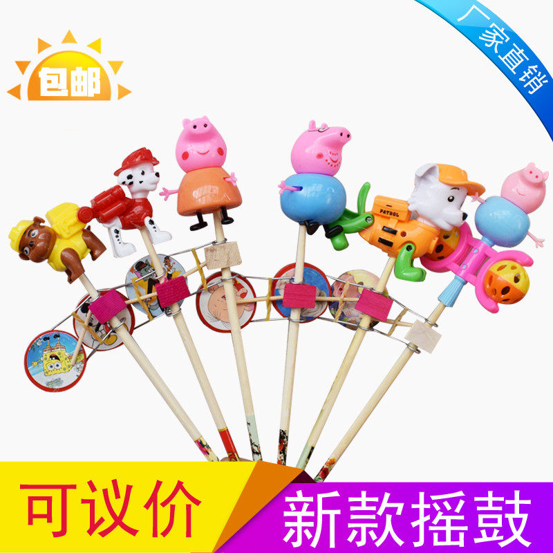 New stall Temple Fair hand drum Color cartoon shake drum Good sale Children's toys Puppet shake drum Ground push shake drum