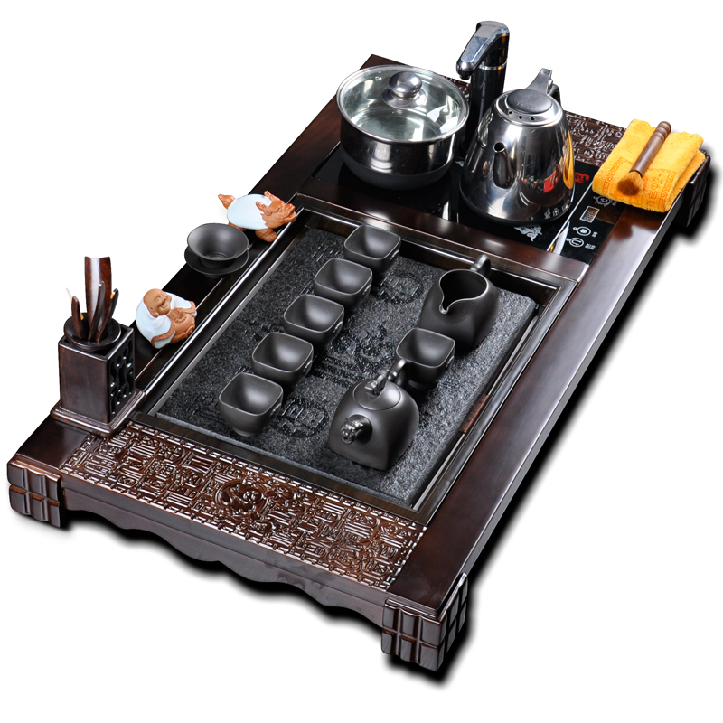 Purple sand tea set is a complete set of kung fu suit, black stone four sharply and solid wood tea tray tea tea kettle