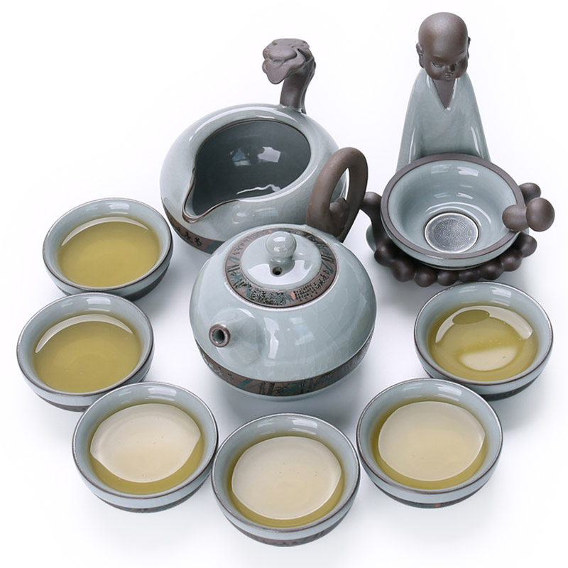 Is your kiln ceramic kung fu tea set home xi shi lid bowl of a complete set of open piece of ice to crack the elder brother of the glaze kiln