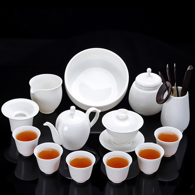 A friend is A complete set of suet jade porcelain kung fu tea set household dehua white porcelain tea set the teapot teacup GaiWanCha sea