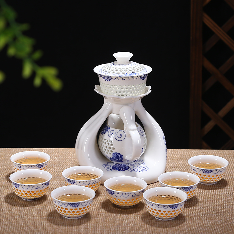 Friends is a complete set of automatic water and exquisite blue and white hollow out tea set suits for against hot insulation teapot