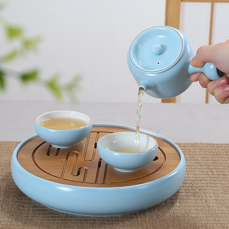 A complete set of ceramic marca color dragon tea tea set tea, A pot of tea tray was four cups of portable travel kettle