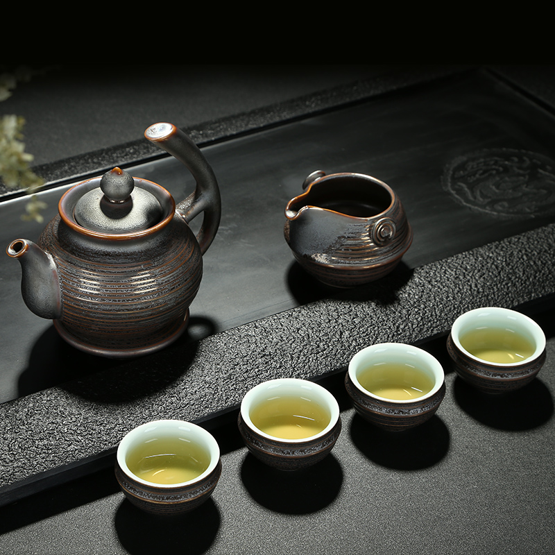 Friend is ceramic tea set iron glaze of a complete set of kung fu tea set the teapot tea pot of gift boxes