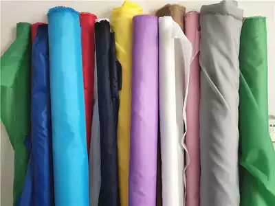 Solid color chemical fiber fabric Polyester fiber clothing lining cloth Bag skirt lining cloth Wedding scene decoration cloth fabric
