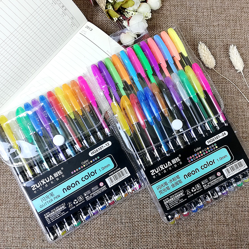 Fluorescent marker and gouache flashing fluorescent pen students with children suit painting color in hand can be used for the black card