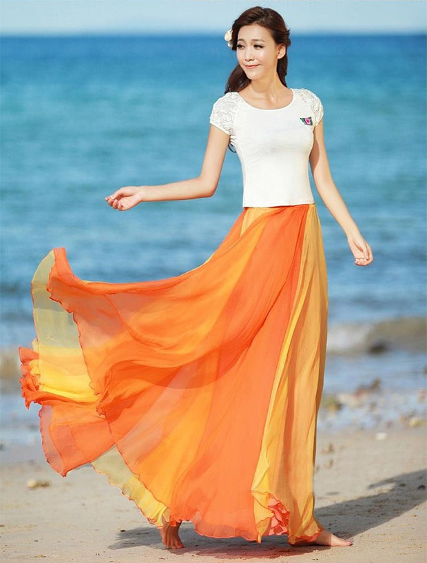 Đầm lụa vàng nửa dài mùa xuân đôi màu sắc phù hợp với áo ba lỗ xếp li cổ tích bãi biển hai chiếc váy xòe lớn mùa hè - Váy chân váy midi dài