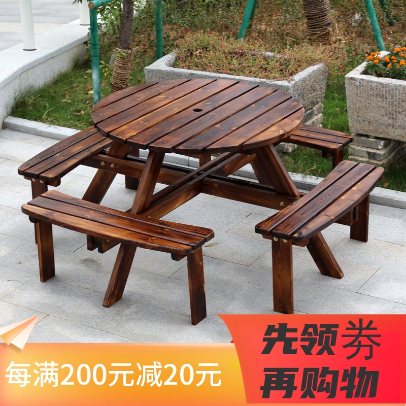 Outdoor balcony courtyard table and chair garden wooden furniture in one stool table carbonized solid wooden field round-core table