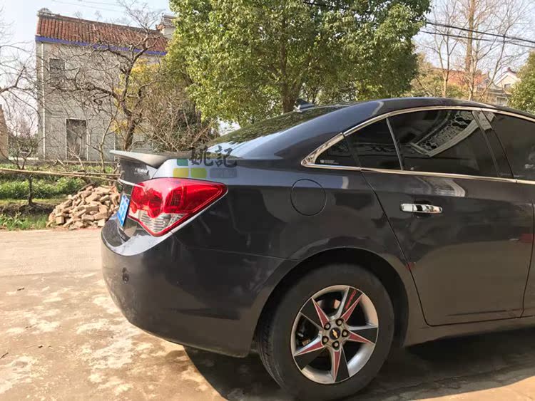 Dongwangyang Cruze sửa đổi đuôi Sanjing đấm gió miễn phí 09-14 đặc biệt Chevrolet Duckbill độ đuôi gió xe ô tô