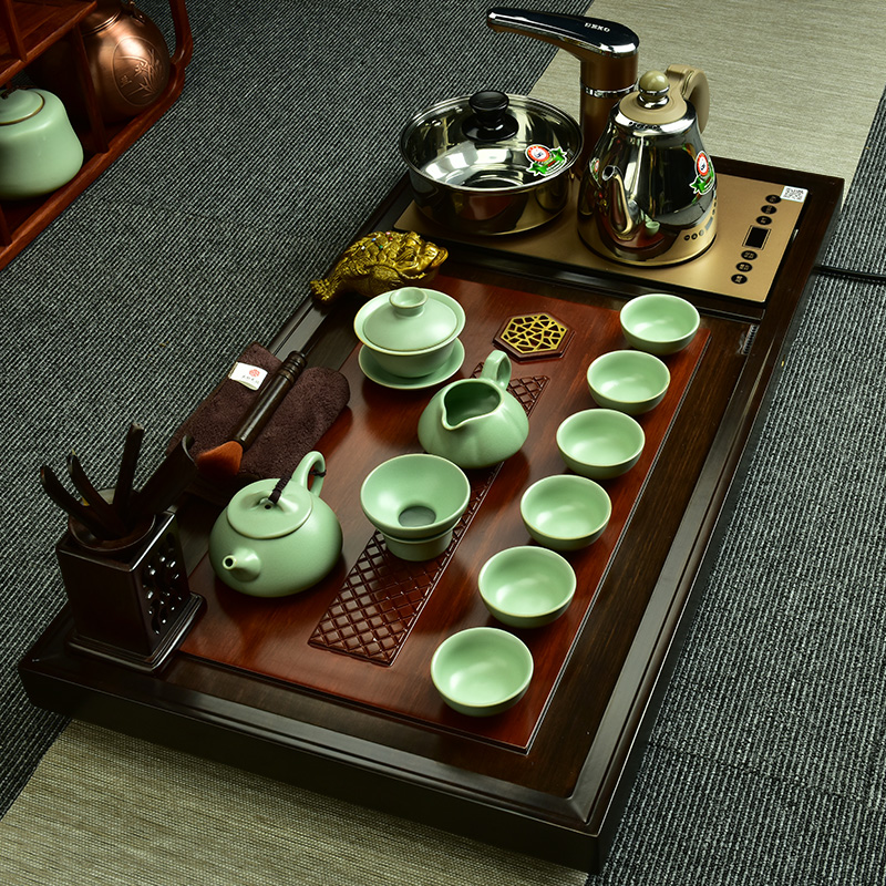 The beginning day, violet arenaceous kung fu tea set of a complete set of domestic The whole piece of wood tea tray was four one automatic induction cooker