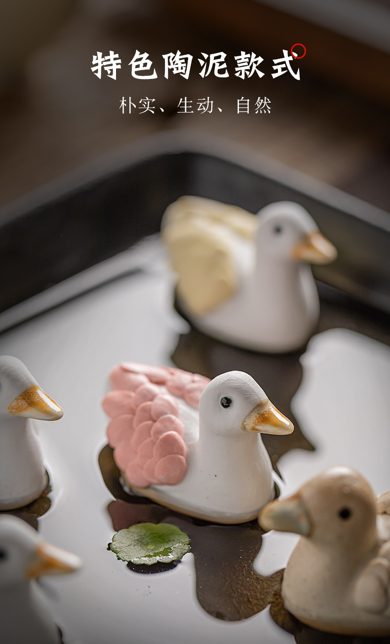 Wilson of refueling duck day jingdezhen ceramic furnishing articles express little ducks manual desktop decoration on the tea table of tea of a pet