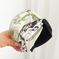 South Koreas Dongdaemun new headband womens high skull knotted headband pressed hair hole hair accessories retro cross wide edge women