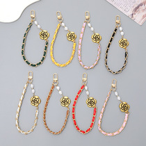 New small balsamic wind string leather pearl bracelet retro rose wrist chain mobile phone shell hanging rope fashion trend accessories