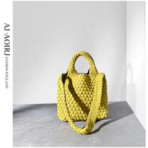 (British little AJ AOIRJ) niche brand design woven tote bag commuter hand basket shoulder bag