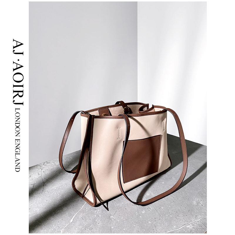 (British little AJ AOIRJ) niche design leather contrast large capacity tote bag simple shoulder bag