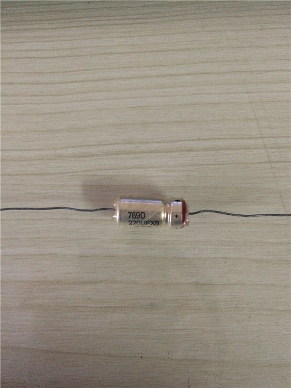 Capacitor 769D 220UFX9 60VDC 0525AA 9 red hair burning friends capacitor
