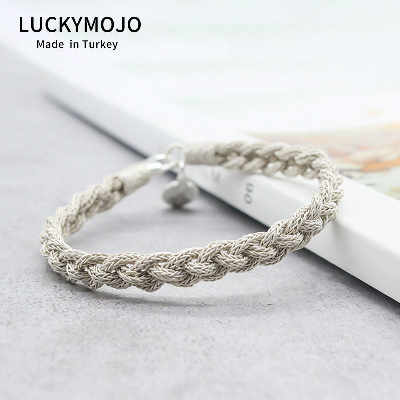 Pure silver handmade female Charins small crowdsourced design hand decorated with light lavish silver ornament lovers silver silk woven jumpy hand rope