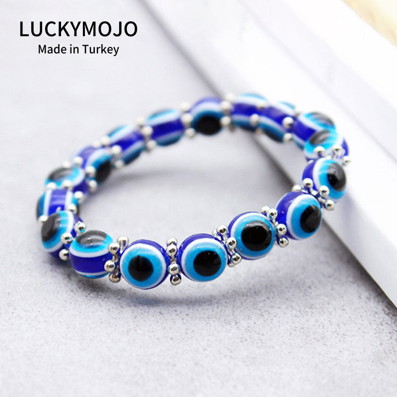 The Eye of the Turkish Devil Blue eyes the small crowd of men and women Hellenic Apati Tears of the Dolesha gifts BR11